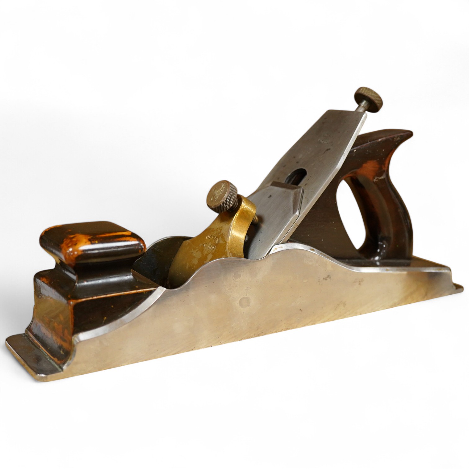 A Norris A1 adjustable steel 14 1/2” panel plane, stamped with Norris, London to both the brass lever cap and the iron, with rosewood infill